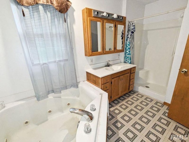 bathroom with shower with separate bathtub and vanity