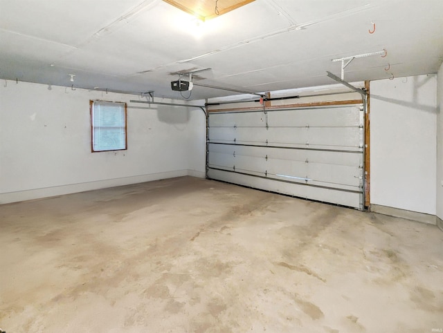 garage featuring a garage door opener