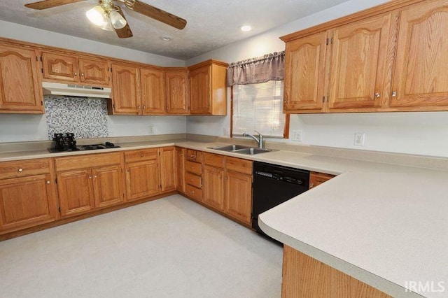 kitchen with black appliances, sink, and ceiling fan