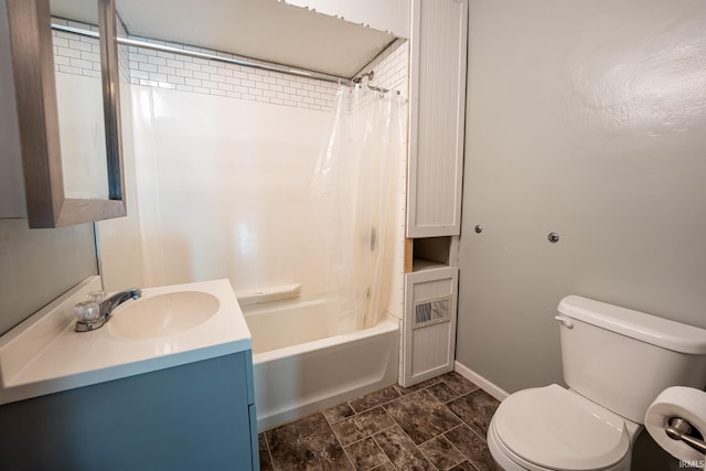 full bathroom featuring toilet, shower / tub combo with curtain, and vanity