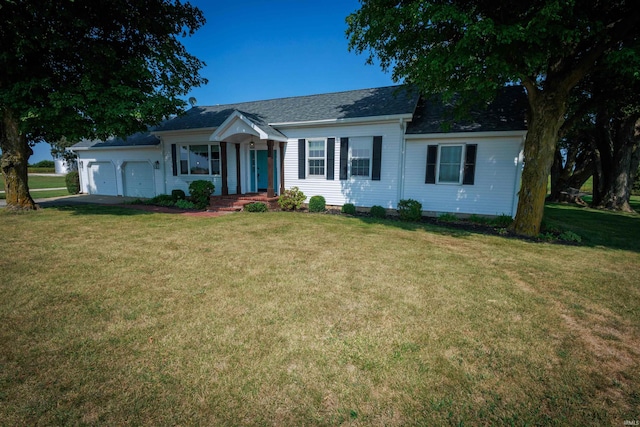 single story home with a garage and a front yard