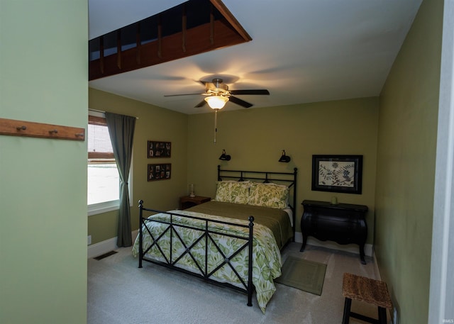 bedroom with light colored carpet and ceiling fan