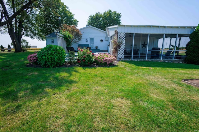 view of yard featuring a sunroom