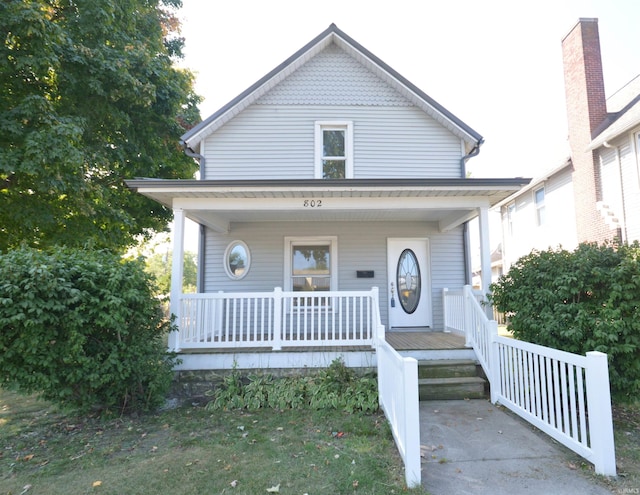 view of front of property featuring covered porch