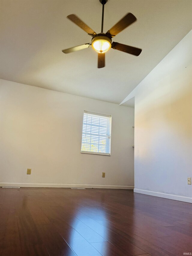 bedroom featuring connected bathroom, dark hardwood / wood-style floors, sink, high vaulted ceiling, and ceiling fan