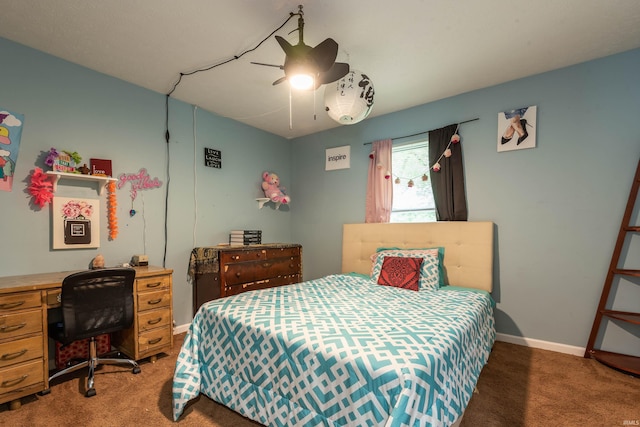 bedroom featuring ceiling fan and dark colored carpet