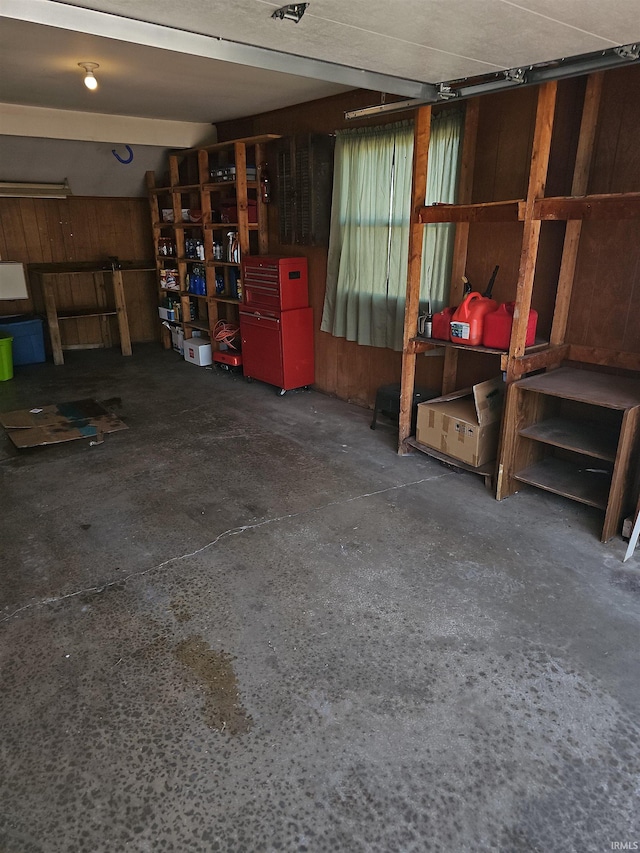 garage with wood walls