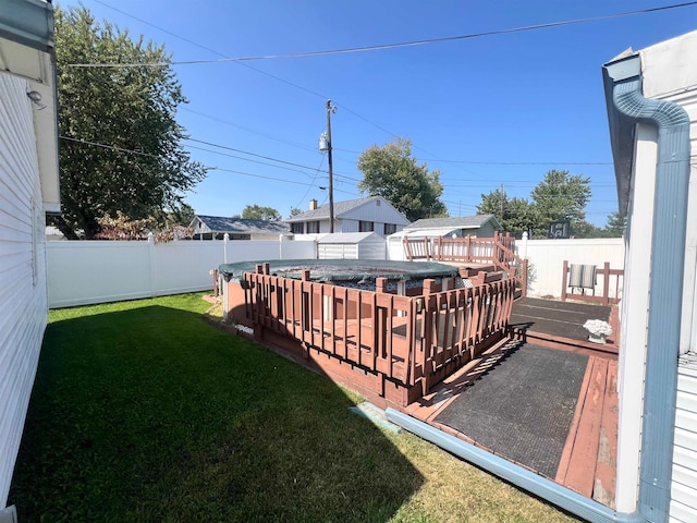 view of yard with a deck