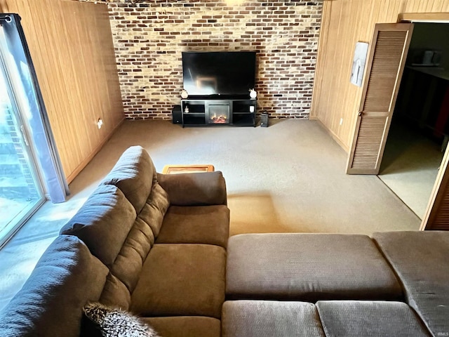 living room featuring brick wall and wooden walls