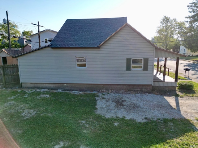 view of property exterior featuring a yard