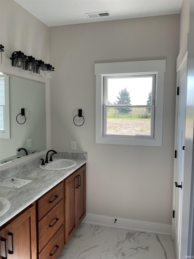 bathroom featuring vanity