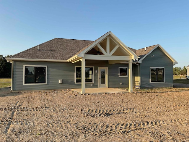 view of front of property featuring a patio area