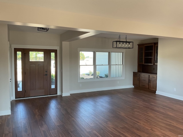 entrance foyer featuring dark hardwood / wood-style flooring