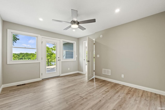 entrance foyer featuring ceiling fan and light hardwood / wood-style flooring