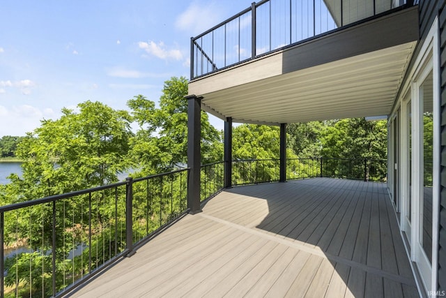 wooden terrace with a water view