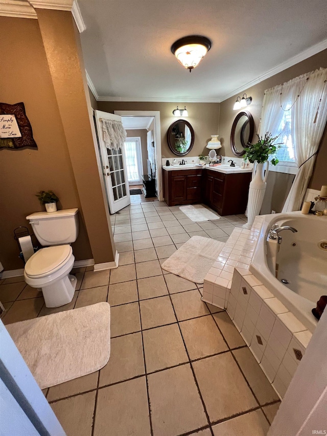 bathroom with crown molding, tiled bath, vanity, and toilet