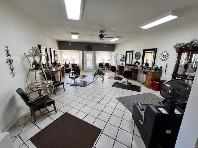 tiled living room with ceiling fan