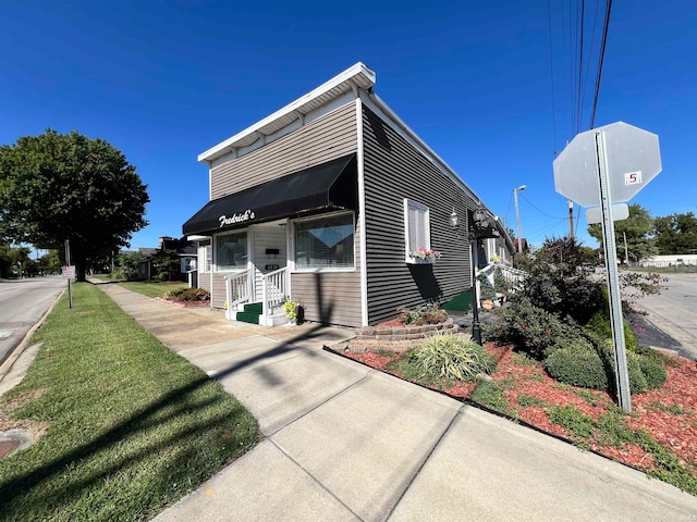 exterior space with a front yard