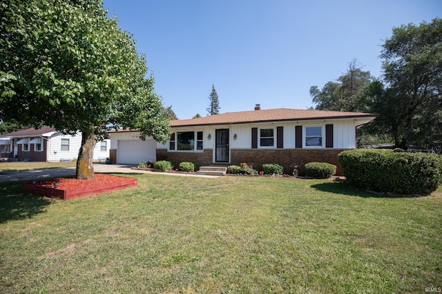 single story home with a garage and a front lawn