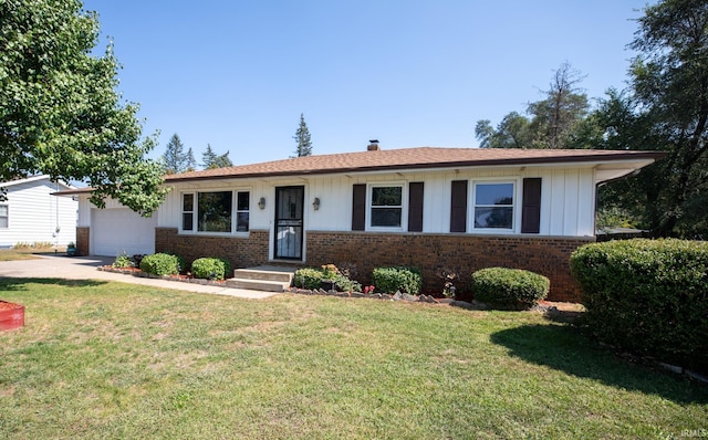 ranch-style home featuring a garage and a front yard