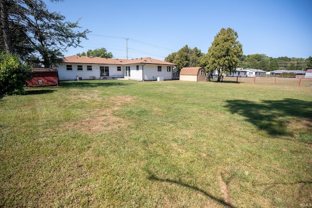 view of yard with a shed