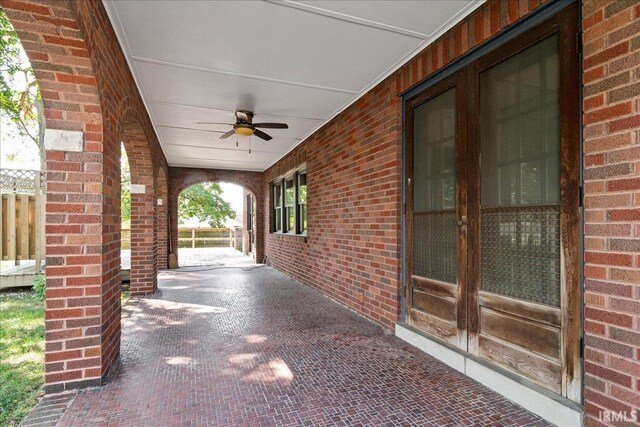 view of patio / terrace featuring ceiling fan