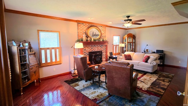 living room featuring ornamental molding, dark wood-type flooring, ceiling fan, and a brick fireplace