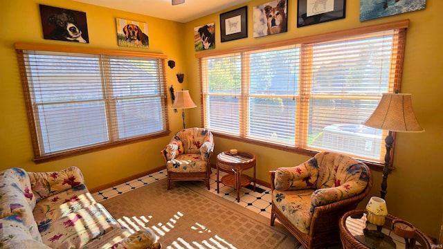 sitting room featuring tile patterned floors