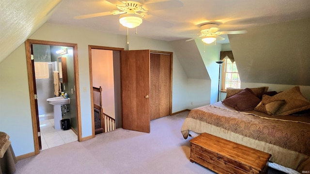 1509 Hawksview Dr, Marion, IN 46952 - bedroom with baseboards, a ceiling fan, vaulted ceiling, and light carpet