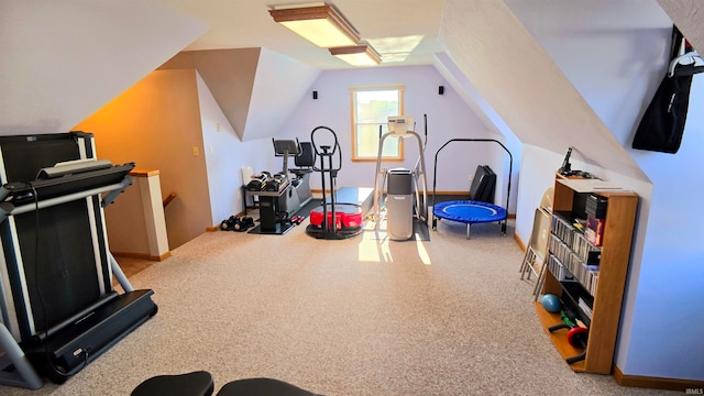 rec room with carpet and vaulted ceiling