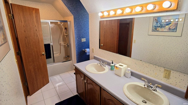 1509 Hawksview Dr, Marion, IN 46952 - bathroom featuring tile patterned floors, shower / bath combination with glass door, double vanity, and a sink