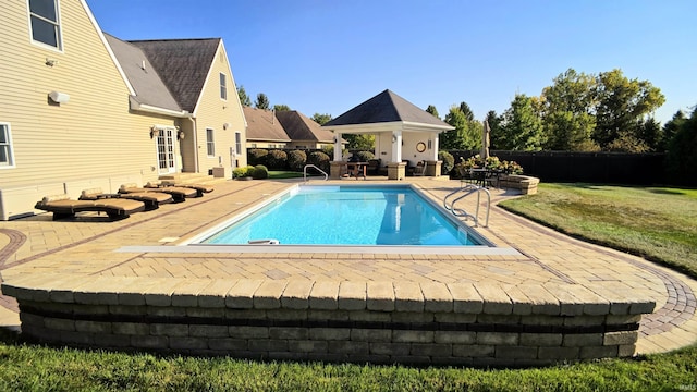 1509 Hawksview Dr, Marion, IN 46952 - view of swimming pool with a fenced in pool, a patio, entry steps, a fenced backyard, and a gazebo