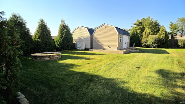 1509 Hawksview Dr, Marion, IN 46952 - exterior space with an outdoor fire pit and fence