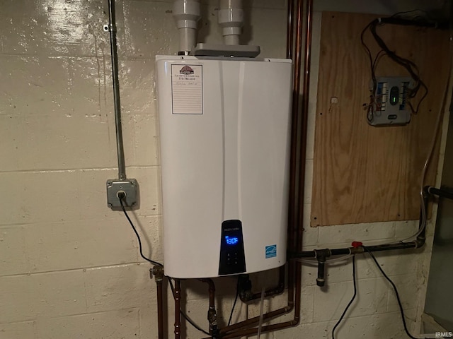 utility room with water heater