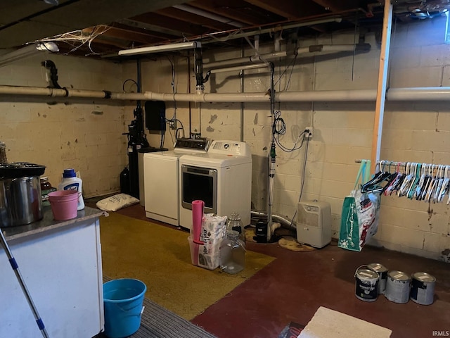 basement with washing machine and dryer