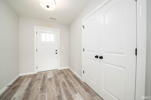 foyer entrance featuring light hardwood / wood-style flooring