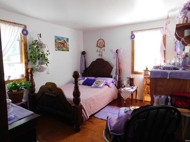 bedroom featuring dark hardwood / wood-style floors