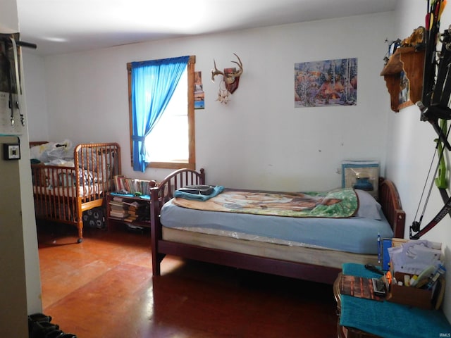 bedroom with concrete flooring