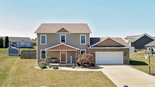 craftsman-style home with a porch, a garage, and a front yard