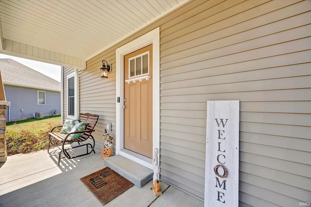 doorway to property with a porch