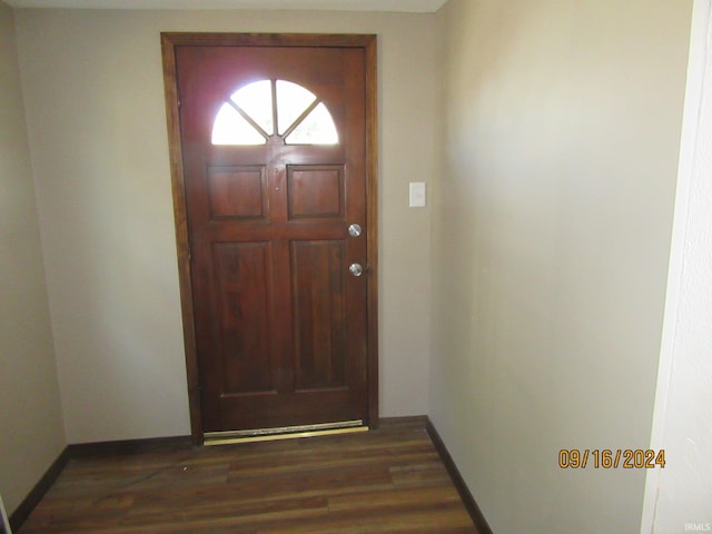 doorway featuring dark hardwood / wood-style flooring