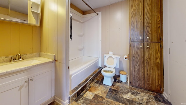 full bathroom featuring vanity, wood walls, toilet, and shower / bathtub combination