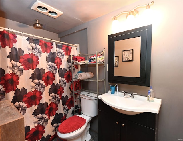 bathroom with vanity and toilet