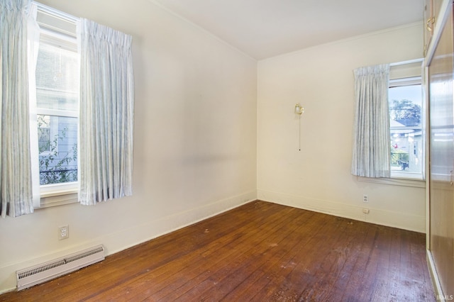 unfurnished room with dark hardwood / wood-style flooring