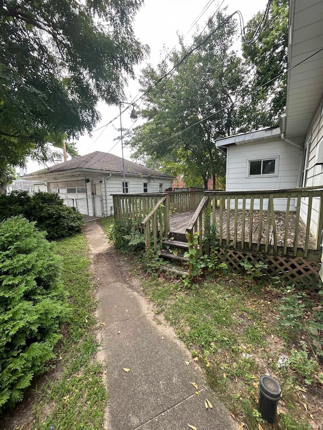 view of yard featuring a wooden deck