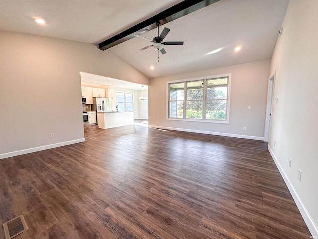 unfurnished living room featuring ceiling fan, vaulted ceiling with beams, and dark hardwood / wood-style floors