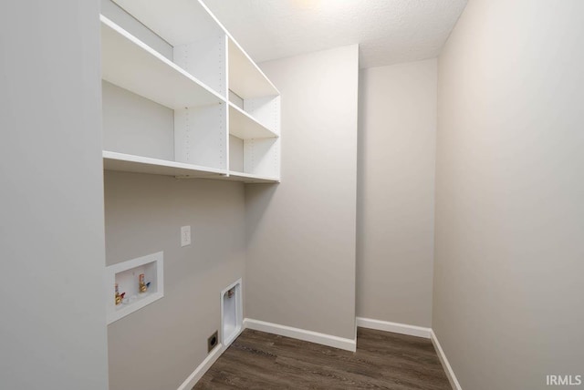 washroom featuring washer hookup, a textured ceiling, electric dryer hookup, and dark wood-type flooring