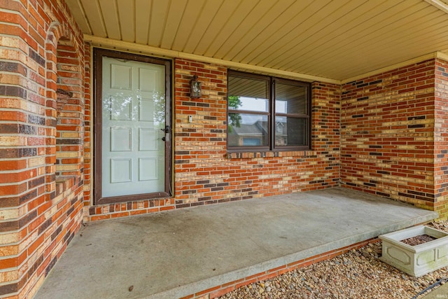 entrance to property with a porch