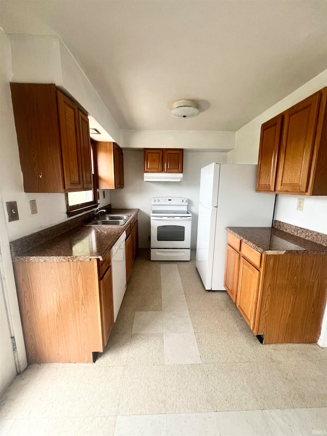 kitchen with white appliances and sink