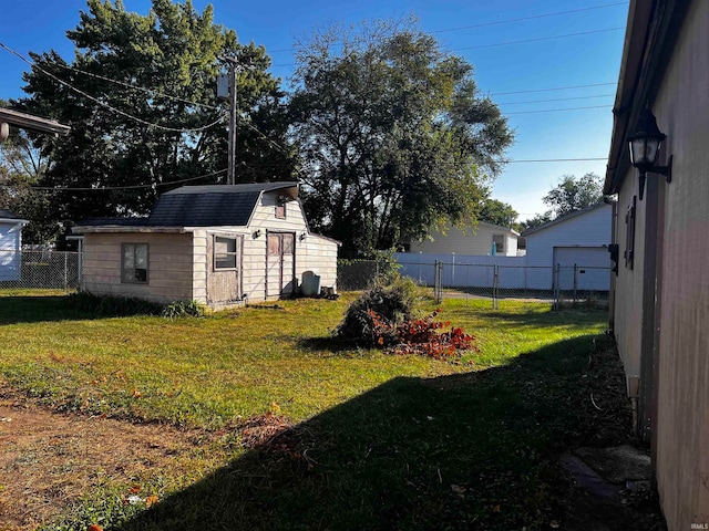 view of yard with a storage unit